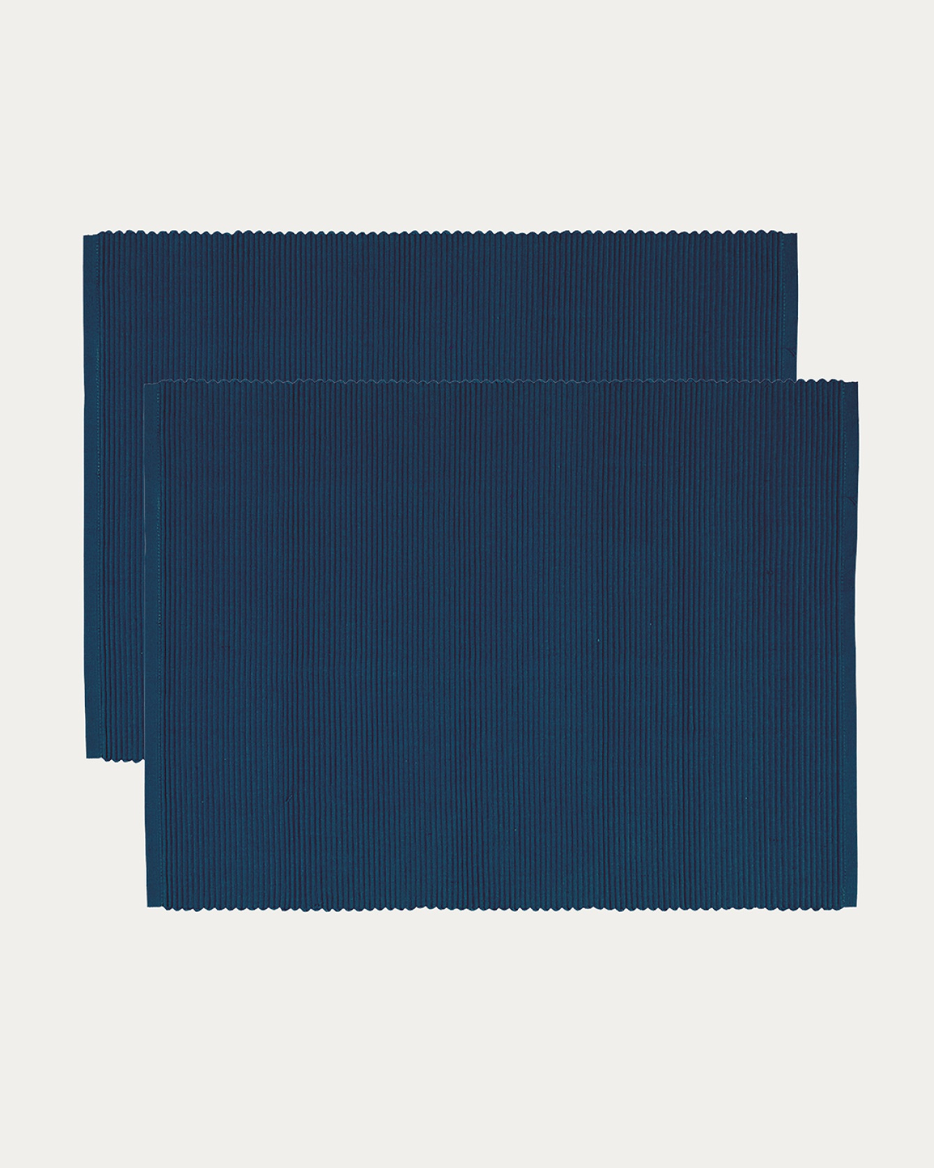 Product image indigo blue UNI placemat made of soft cotton in ribbed quality from LINUM DESIGN. Size 35x46 cm and sold in 2-pack.