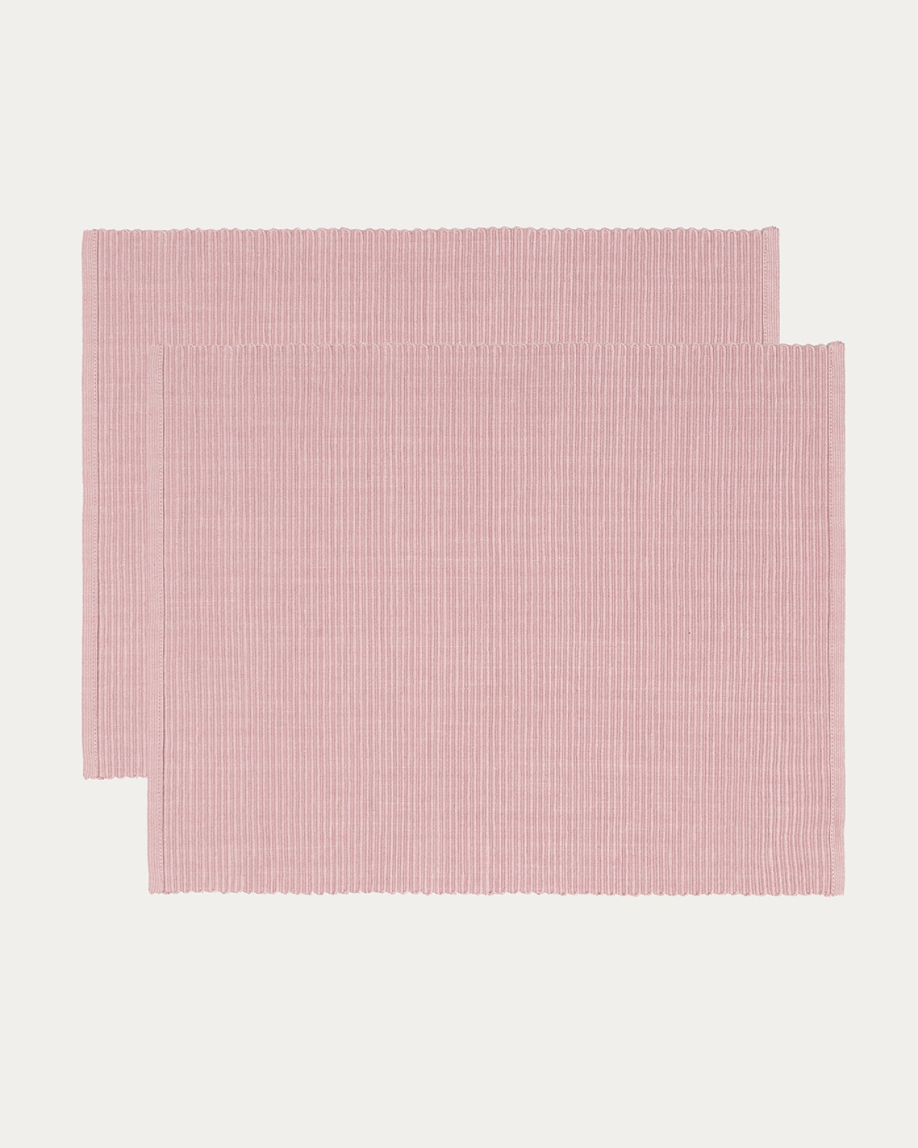 Produktbild dammig rosa UNI bordstablett av mjuk bomull i ribbad kvalité från LINUM DESIGN. Storlek 35x46 cm och säljs i 2-pack.