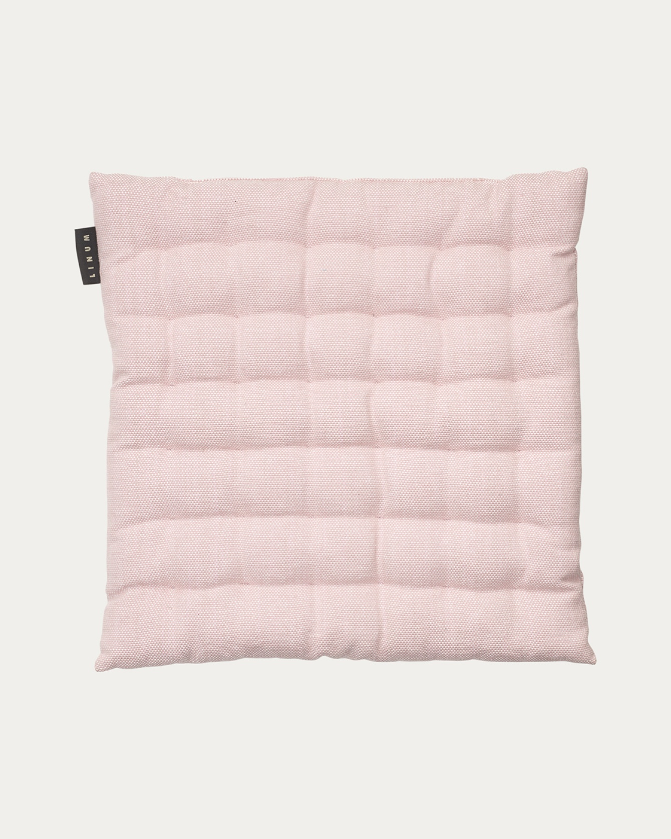 Produktbild dammig rosa PEPPER sittdyna av mjuk bomull med återvunnen polyesterfyllning från LINUM DESIGN. Storlek 40x40 cm.